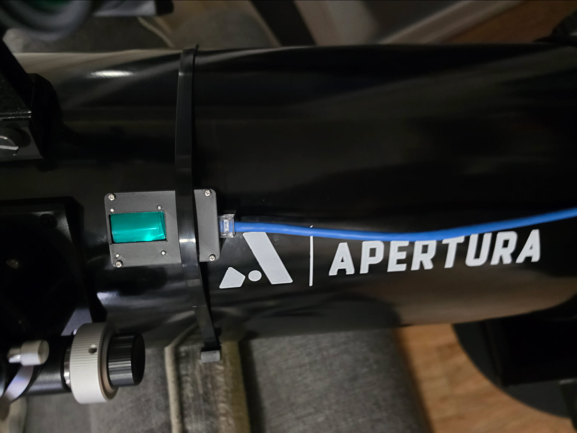 Display mounted near the eyepiece end
